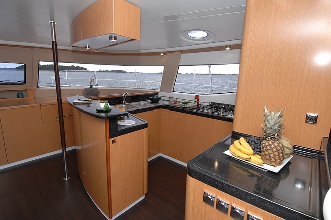 Fountaine Pajot Salina48 Evolution galley with corian bench tops and good ventilation - Multihull Solutions: © Multihull Solutions http://www.multihullsolutions.com.au/